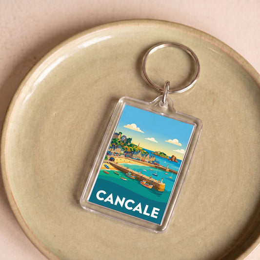 Porte-clés souvenir de la ville de Cancale avec une illustration stylisée et colorée.