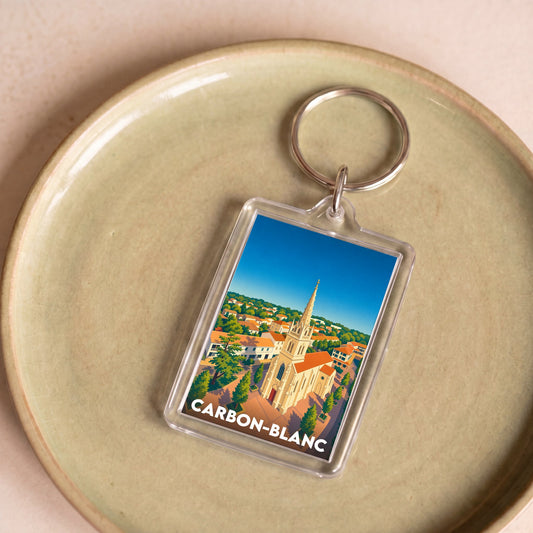 Porte-clés souvenir de la ville de Carbon-Blanc avec une illustration stylisée.