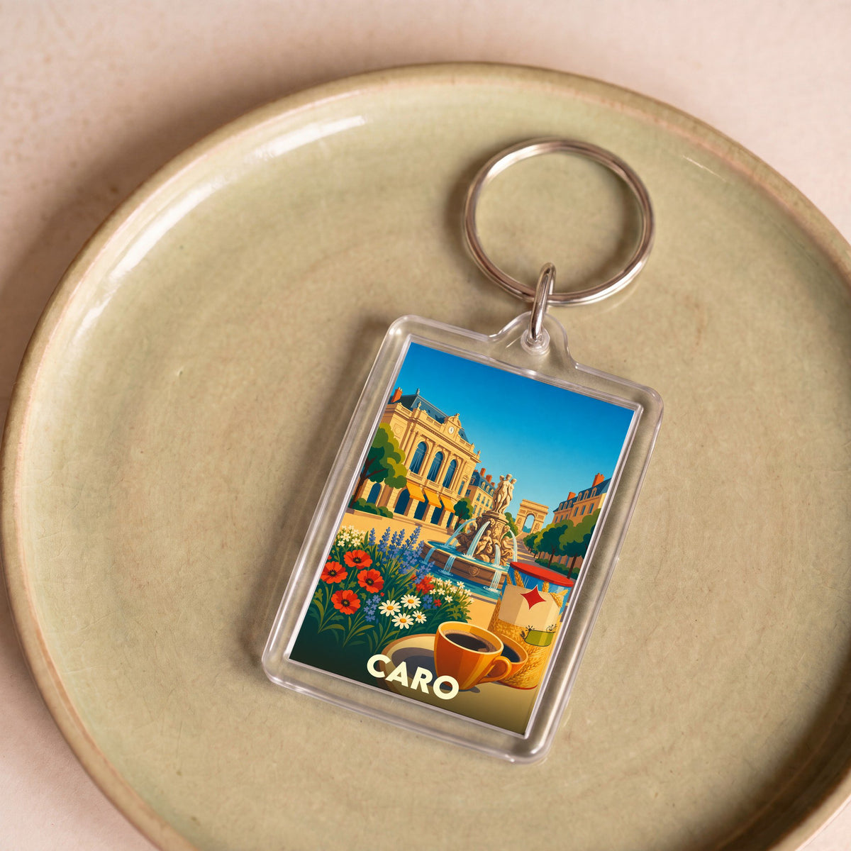 Porte-clés souvenir de la ville de Caro avec une illustration colorée et stylisée.