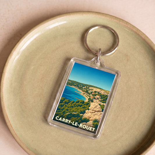 Porte-clés souvenir de la ville de Carry-le-Rouet avec une illustration stylisée de son littoral.