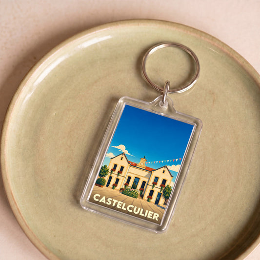 Porte-clés souvenir de la ville de Castelculier avec une illustration stylisée.