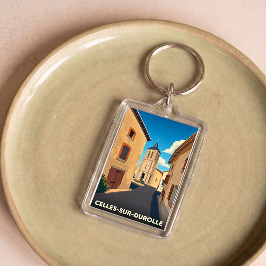 Porte-clés souvenir de la ville de Celles-sur-Durolle avec une illustration stylisée.