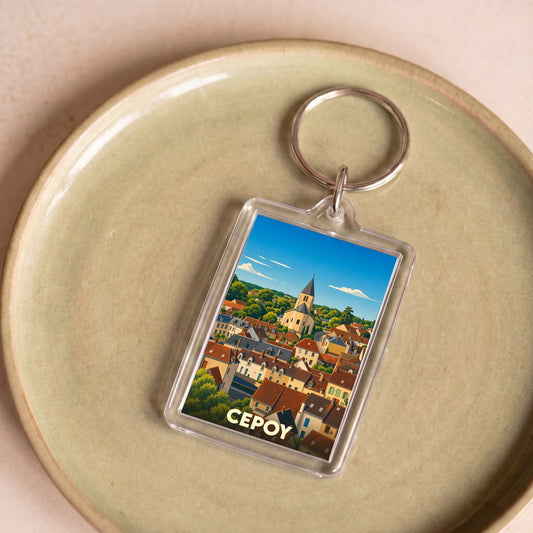 Porte-clés souvenir de la ville de Cepoy avec une illustration stylisée.