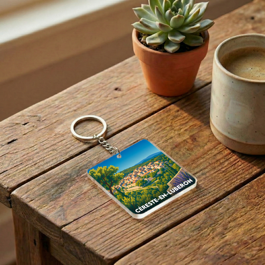 Porte-clés souvenir de la ville de Céreste-en-Luberon avec une illustration stylisée.