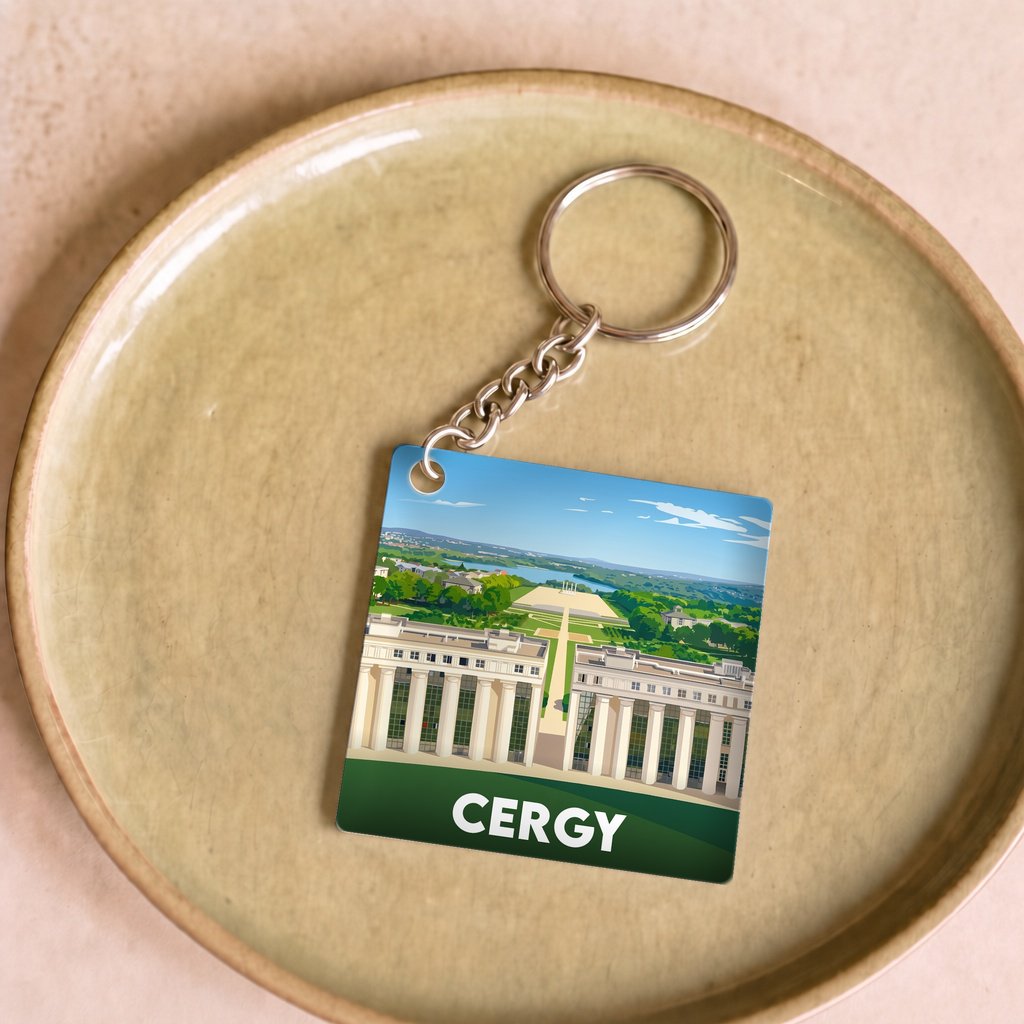 Porte-clés souvenir de la ville de Cergy avec une illustration stylisée.