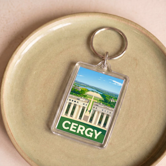 Porte-clés souvenir de la ville de Cergy avec une illustration stylisée.