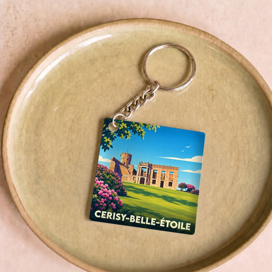 Porte-clés souvenir de la ville de Cerisy-Belle-Étoile avec une illustration stylisée de son abbaye.