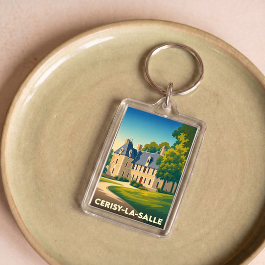 Porte-clés souvenir de la ville de Cerisy-la-Salle avec une illustration stylisée du château.