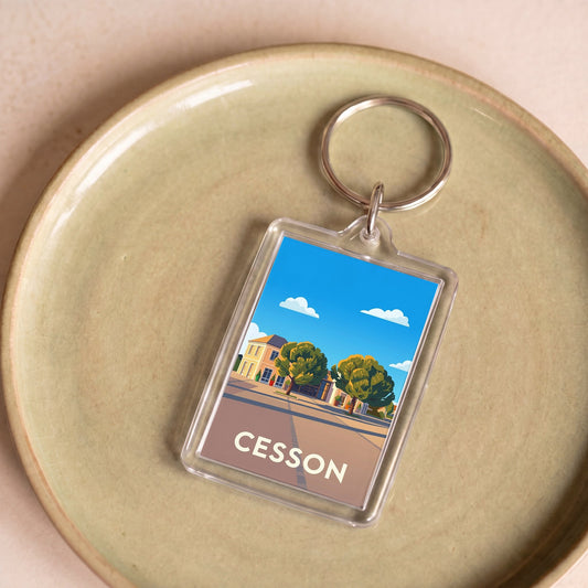 Porte-clés souvenir de la ville de Cesson avec une illustration stylisée.