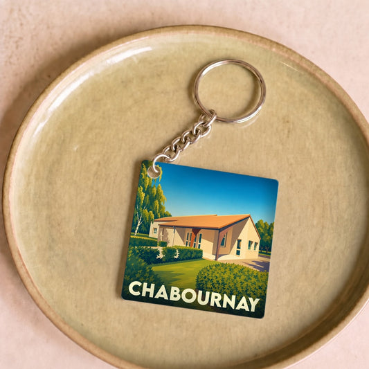 Porte-clés souvenir de la ville de Chabournay avec une illustration stylisée.