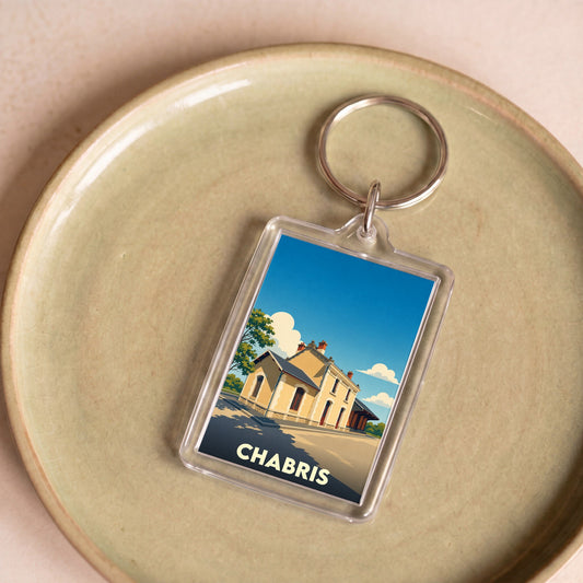 Porte-clés souvenir de la ville de Chabris avec une illustration stylisée de sa gare.