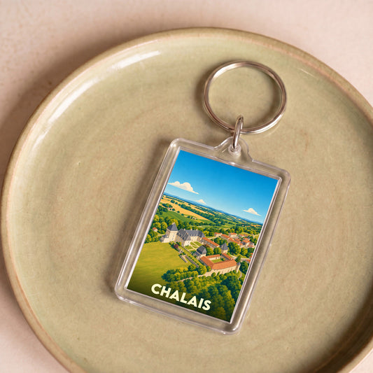 Porte-clés souvenir de la ville de Chalais avec une illustration stylisée.