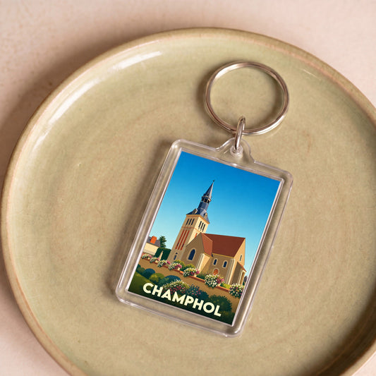 Porte-clés souvenir de la ville de Champhol avec une illustration stylisée de son église.