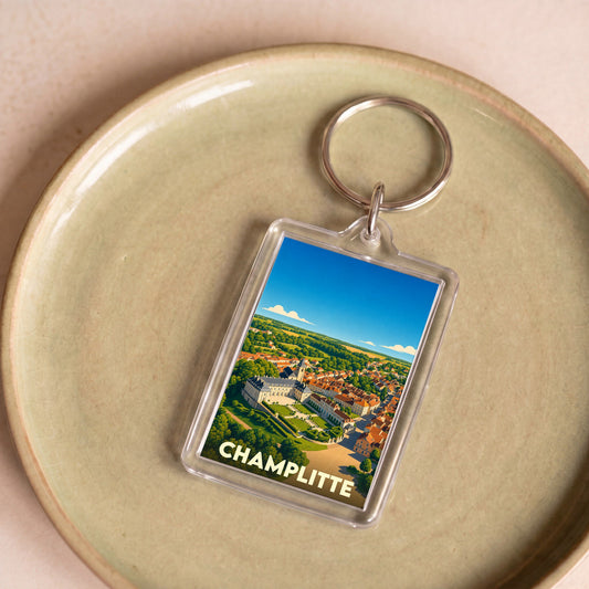 Porte-clés souvenir de la ville de Champlitte avec une illustration stylisée vue du ciel.