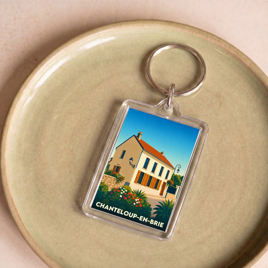 Porte-clés souvenir de la ville de Chanteloup-en-Brie avec une illustration stylisée.