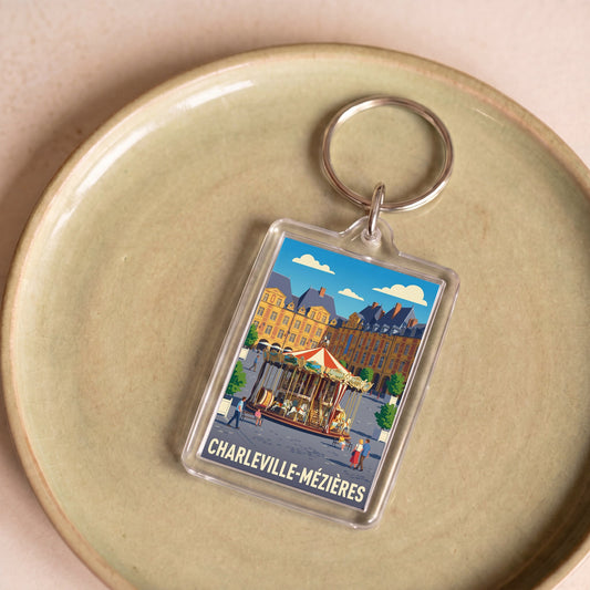Porte-clés souvenir de la ville de Charleville-Mézières avec une illustration stylisée.