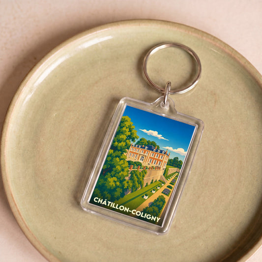 Porte-clés souvenir de la ville de Châtillon-Coligny avec une illustration stylisée de son château et de ses jardins.