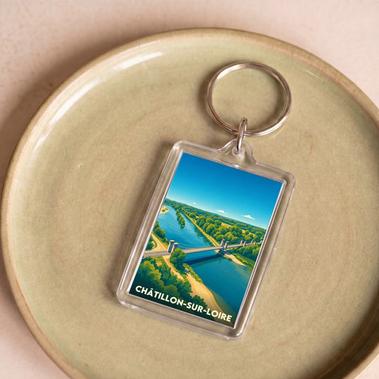 Porte-clés souvenir de la ville de Châtillon-sur-Loire avec une illustration stylisée de son pont au-dessus du fleuve.
