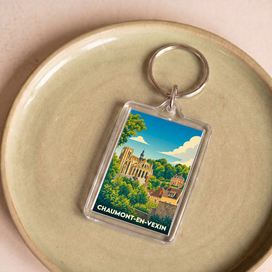 Porte-clés souvenir de la ville de Chaumont-en-Vexin avec une illustration stylisée.