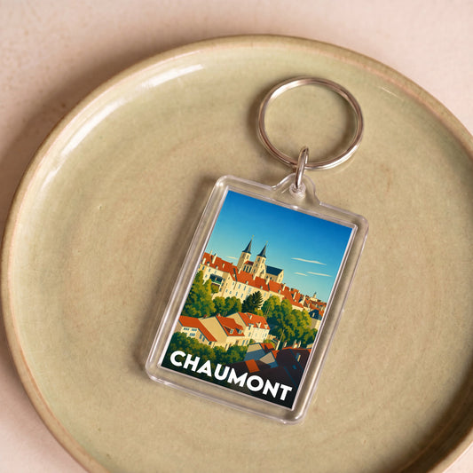 Porte-clés souvenir de la ville de Chaumont avec une illustration stylisée.