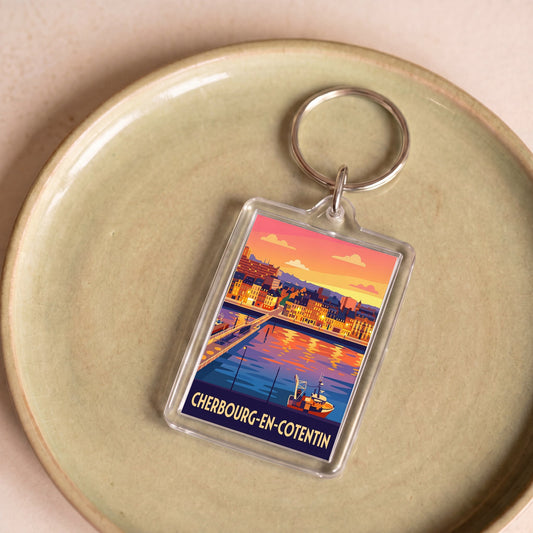 Porte-clés souvenir de la ville de Cherbourg-en-Cotentin avec une illustration stylisée du port.