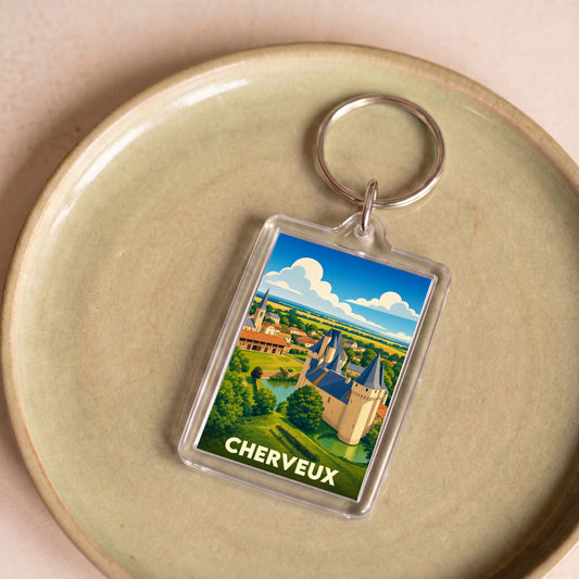 Porte-clés souvenir de la ville de Cherveux avec une illustration stylisée de son château.