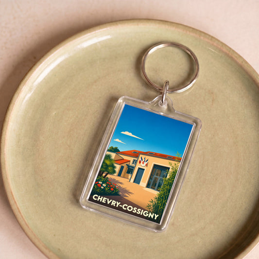 Porte-clés souvenir de la ville de Chevry-Cossigny avec une illustration stylisée.