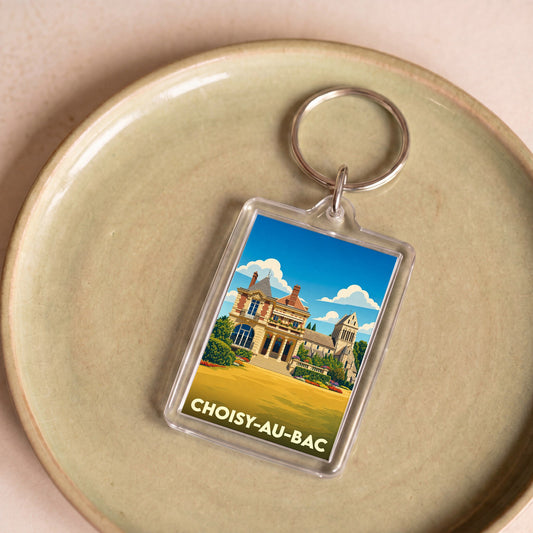 Porte-clés souvenir de la ville de Choisy-au-Bac avec une illustration stylisée de son patrimoine.