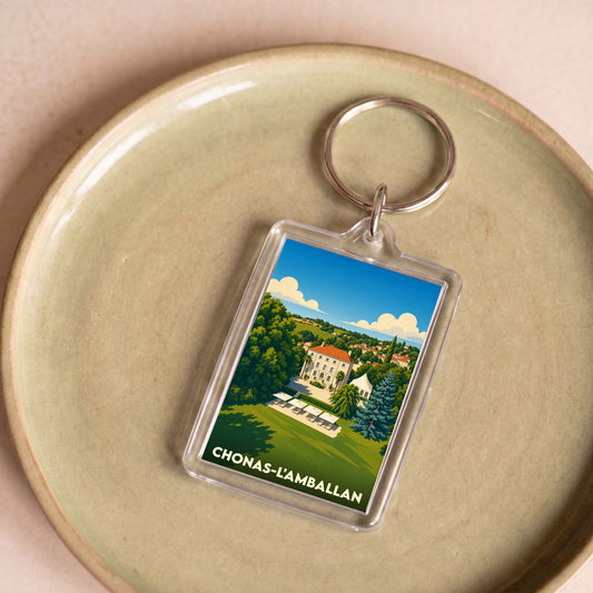 Porte-clés souvenir de la ville de Chonas-l'Amballan avec une illustration stylisée.