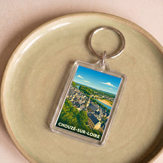 Porte-clés souvenir de la ville de Chouzé-sur-Loire avec une illustration stylisée.