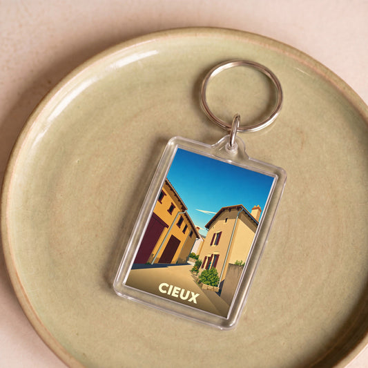 Porte-clés souvenir de la ville de Cieux avec une illustration stylisée.
