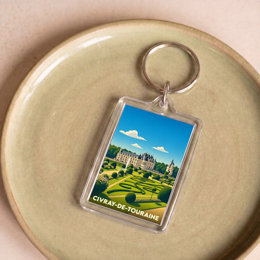 Porte-clés souvenir de la ville de Civray-de-Touraine avec une illustration stylisée d'un château et de ses jardins.