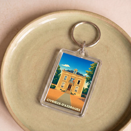 Porte-clés souvenir de la ville de Civrieux-d'Azergues avec une illustration stylisée.