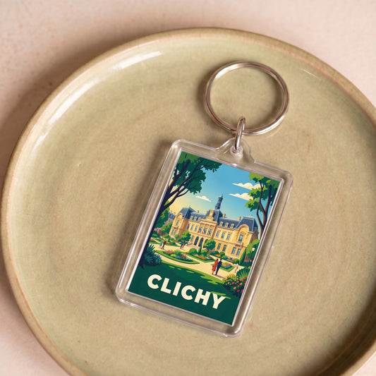 Porte-clés souvenir de la ville de Clichy avec une illustration stylisée.