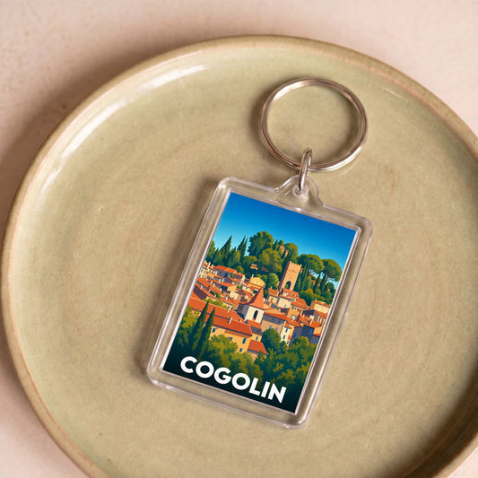 Porte-clés souvenir de la ville de Cogolin avec une illustration stylisée.