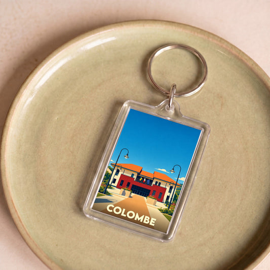 Porte-clés souvenir de la ville de Colombe avec une illustration stylisée de sa mairie.