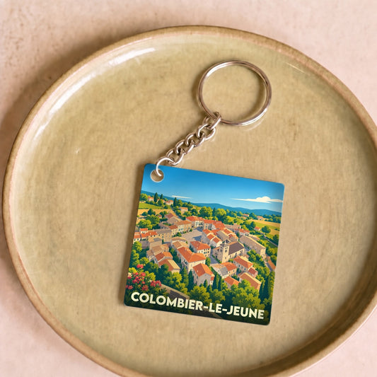 Porte-clés souvenir de la ville de Colombier-le-Jeune avec une illustration stylisée du village.
