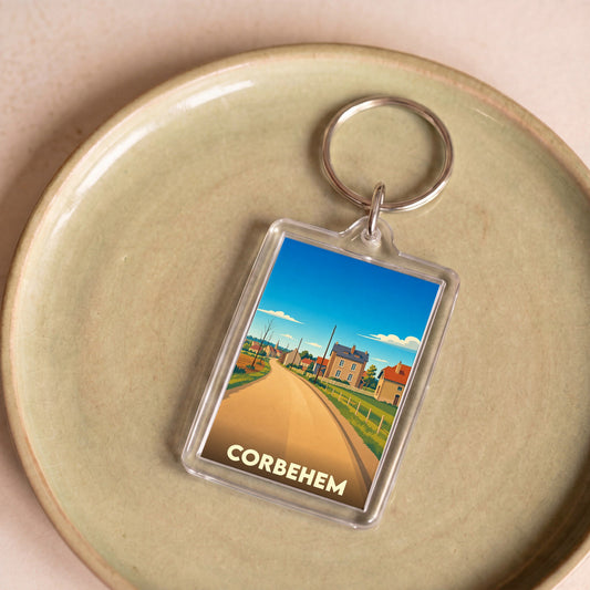 Porte-clés souvenir de la ville de Corbehem avec une illustration stylisée.