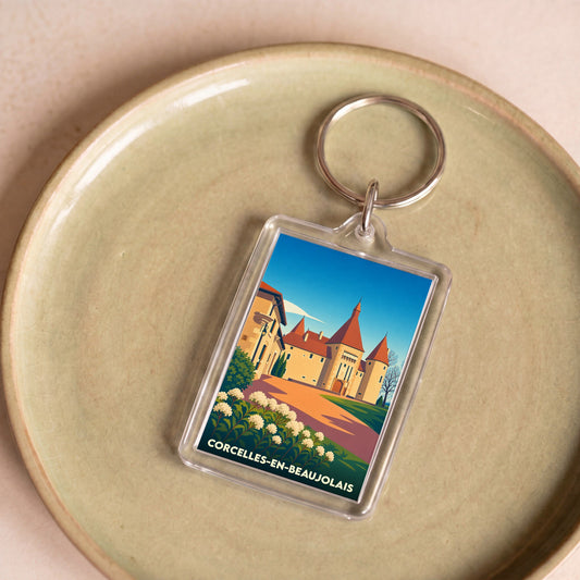 Porte-clés souvenir de Corcelles-en-Beaujolais orné d'une illustration stylisée de son château.
