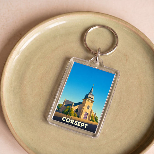 Porte-clés souvenir de la ville de Corsept avec une illustration stylisée de son église.