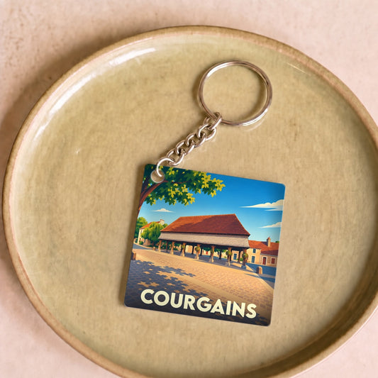 Porte-clés souvenir de la ville de Courgains avec une illustration stylisée de ses halles.