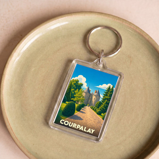 Porte-clés souvenir de la ville de Courpalay avec une illustration stylisée de son château.