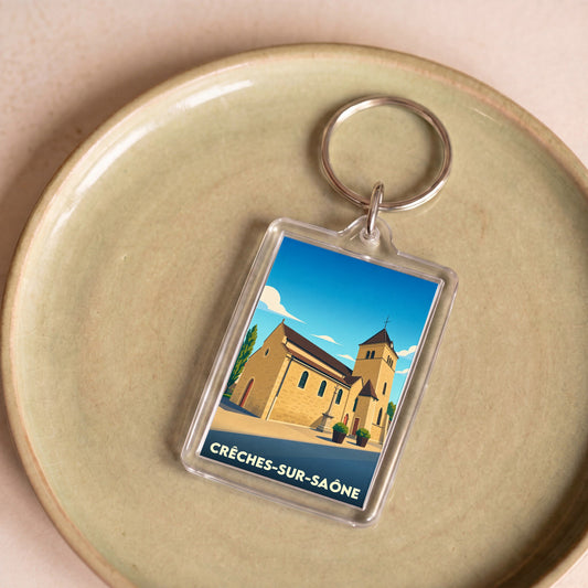 Porte-clés souvenir de la ville de Crêches-sur-Saône avec une illustration stylisée.