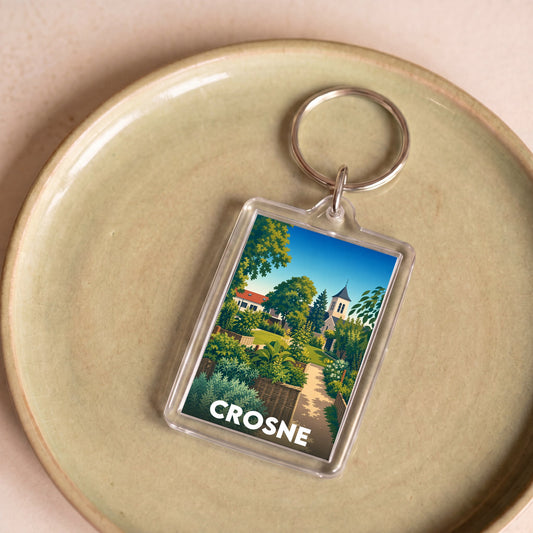 Porte-clés souvenir de la ville de Crosne avec une illustration stylisée et colorée.