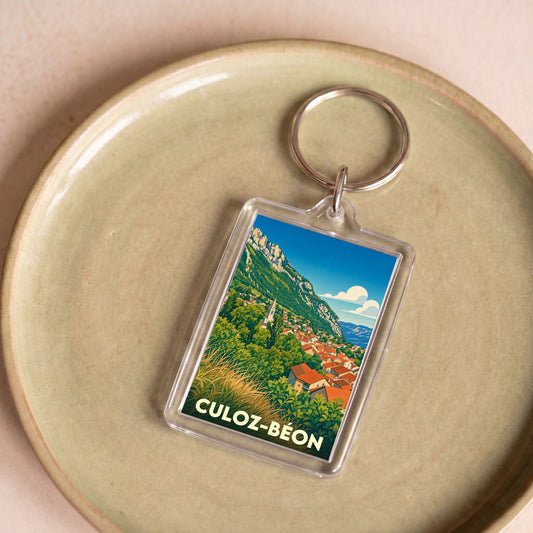 Porte-clés souvenir de la ville de Culoz-Béon avec une illustration stylisée.