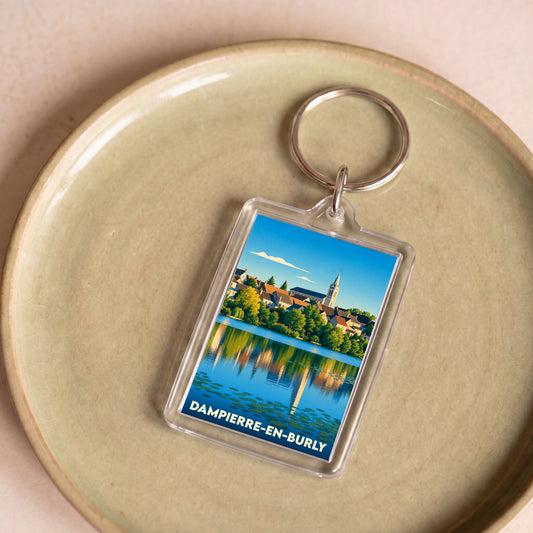 Porte-clés souvenir de la ville de Dampierre-en-Burly avec une illustration stylisée des bords de Loire.