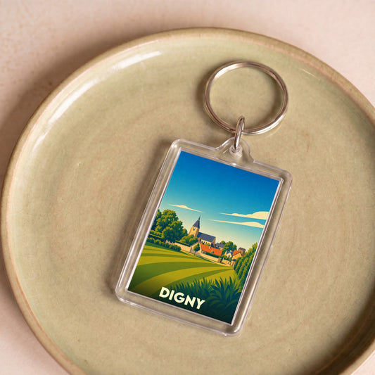 Porte-clés souvenir de la ville de Digny avec une illustration stylisée.