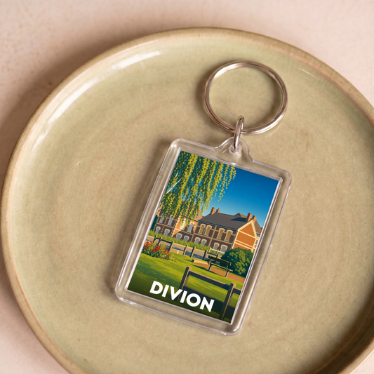 Porte-clés souvenir de la ville de Divion avec une illustration stylisée.