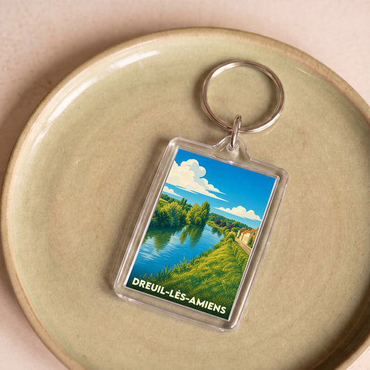 Porte-clés souvenir de la ville de Dreuil-lès-Amiens avec une illustration stylisée des bords de Somme.
