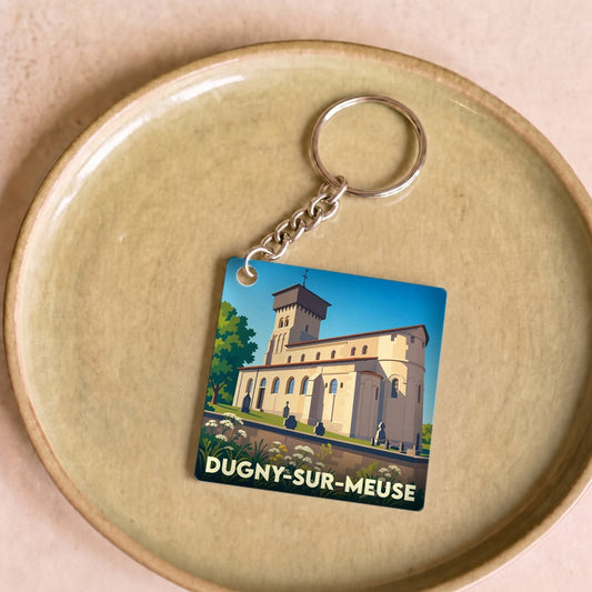 Porte-clés souvenir de la ville de Dugny-sur-Meuse avec une illustration stylisée de son église fortifiée.